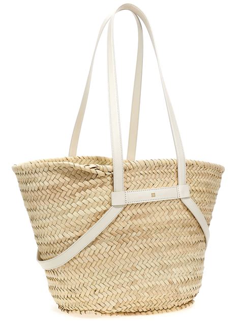 Medium Voyou basket bag in raffia 